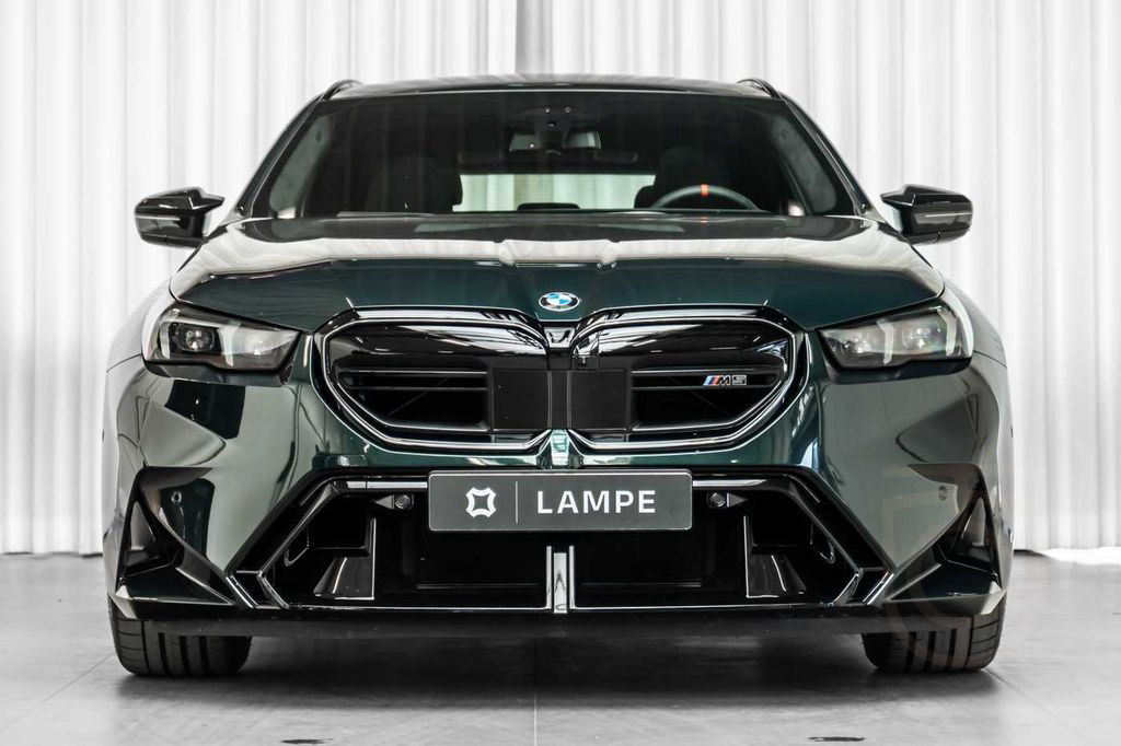 BMW M5 Touring Oxford Green Akrapovič PPF B&W Pano A